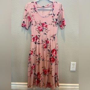 A pretty pink small dress from Sweet Claire!